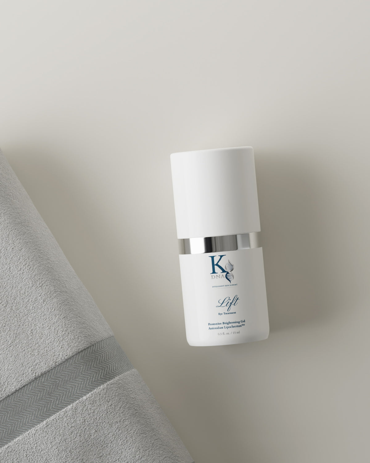 Skincare bottle labeled 'Soul Skin' on a neutral background with a gray towel.
