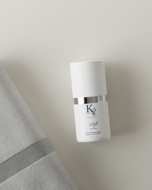 Skincare bottle labeled 'Soul Skin' on a neutral background with a gray towel.