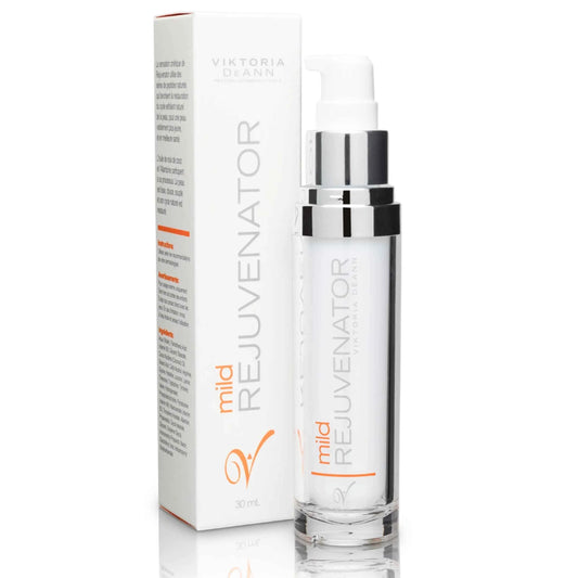 Viktoria Deann Mild Rejuvenator skincare set featuring a clear glass pump bottle with a white cap and a white product box, both with silver and orange accents, on a white background.